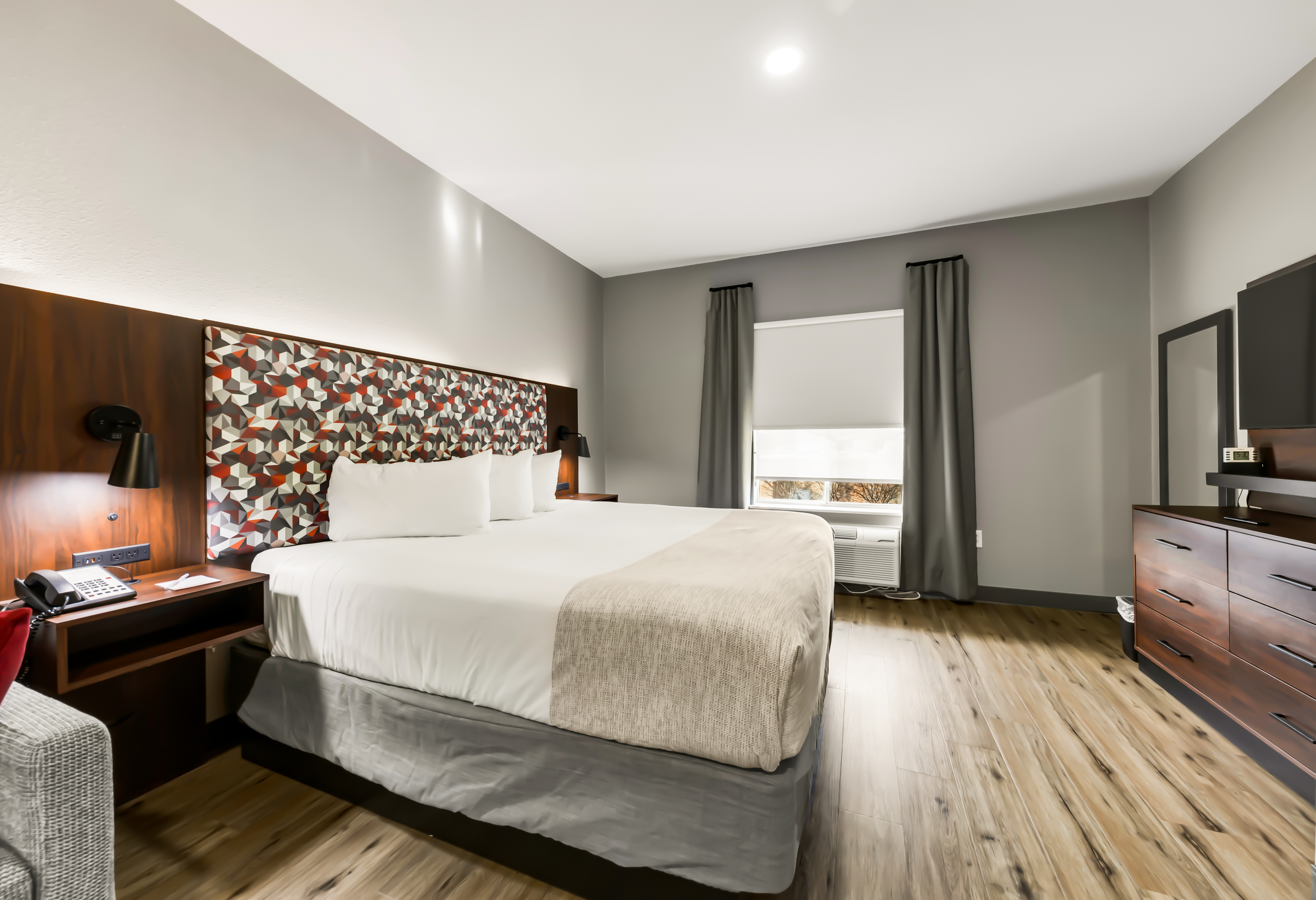 Guest room at the Hawthorn Extended Stay by Wyndham College Station in College Station, Texas